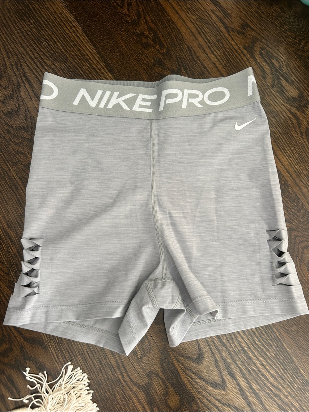 Nike Women's Light Gray Pro Athletic Shorts with Lattice Side Detail